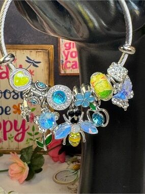 Silver Floral & Bee Charm Bracelet with Blue and Yellow Accents